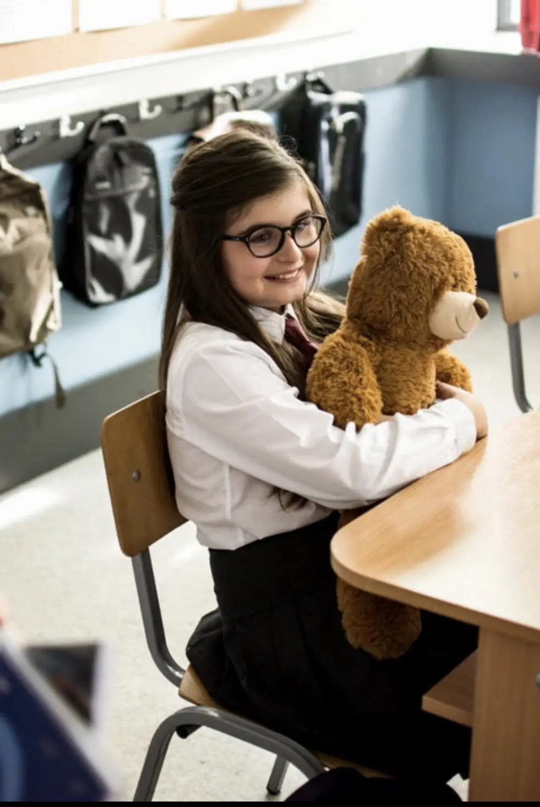 In costume on the classroom set