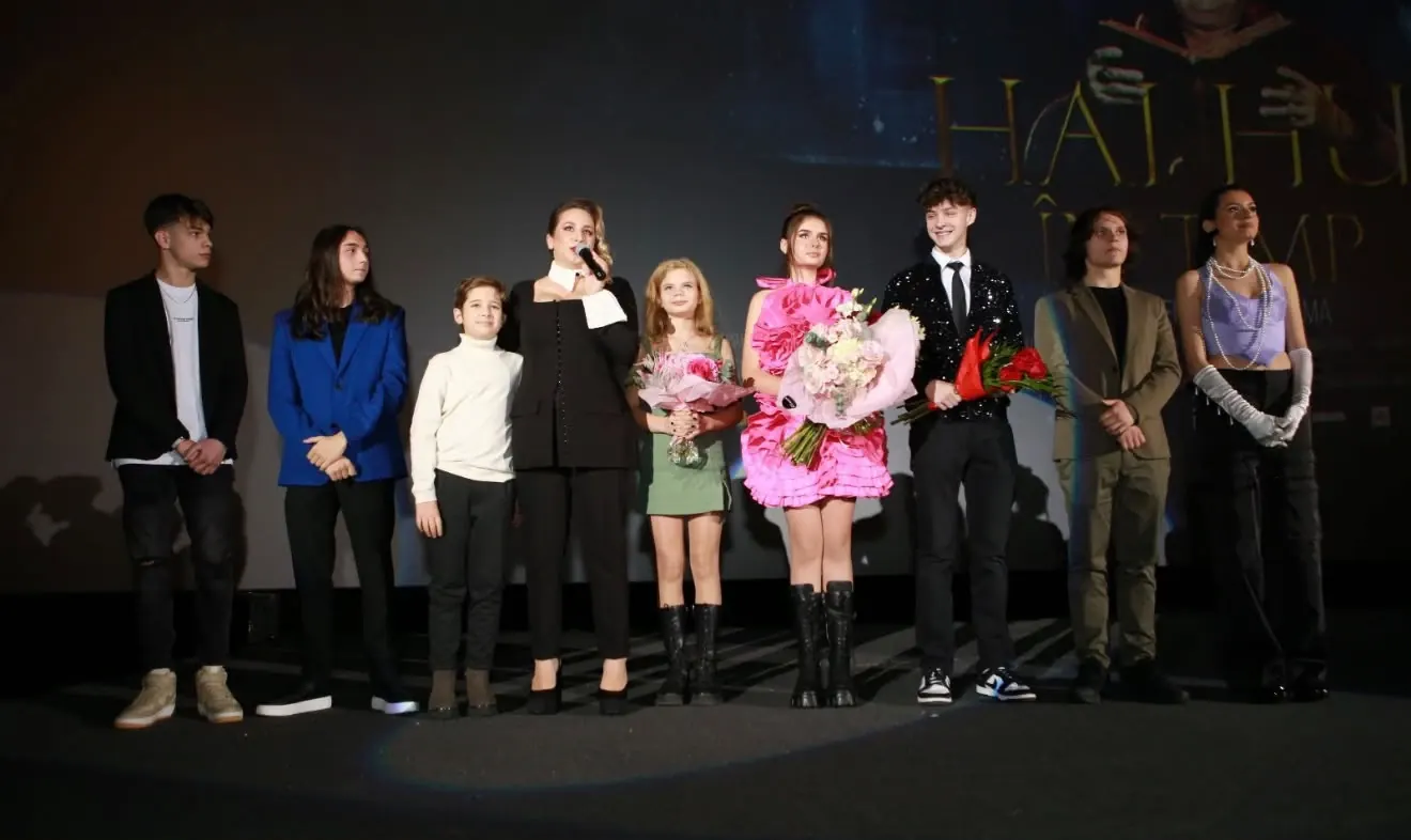 On stage with the cast at the premiere screening