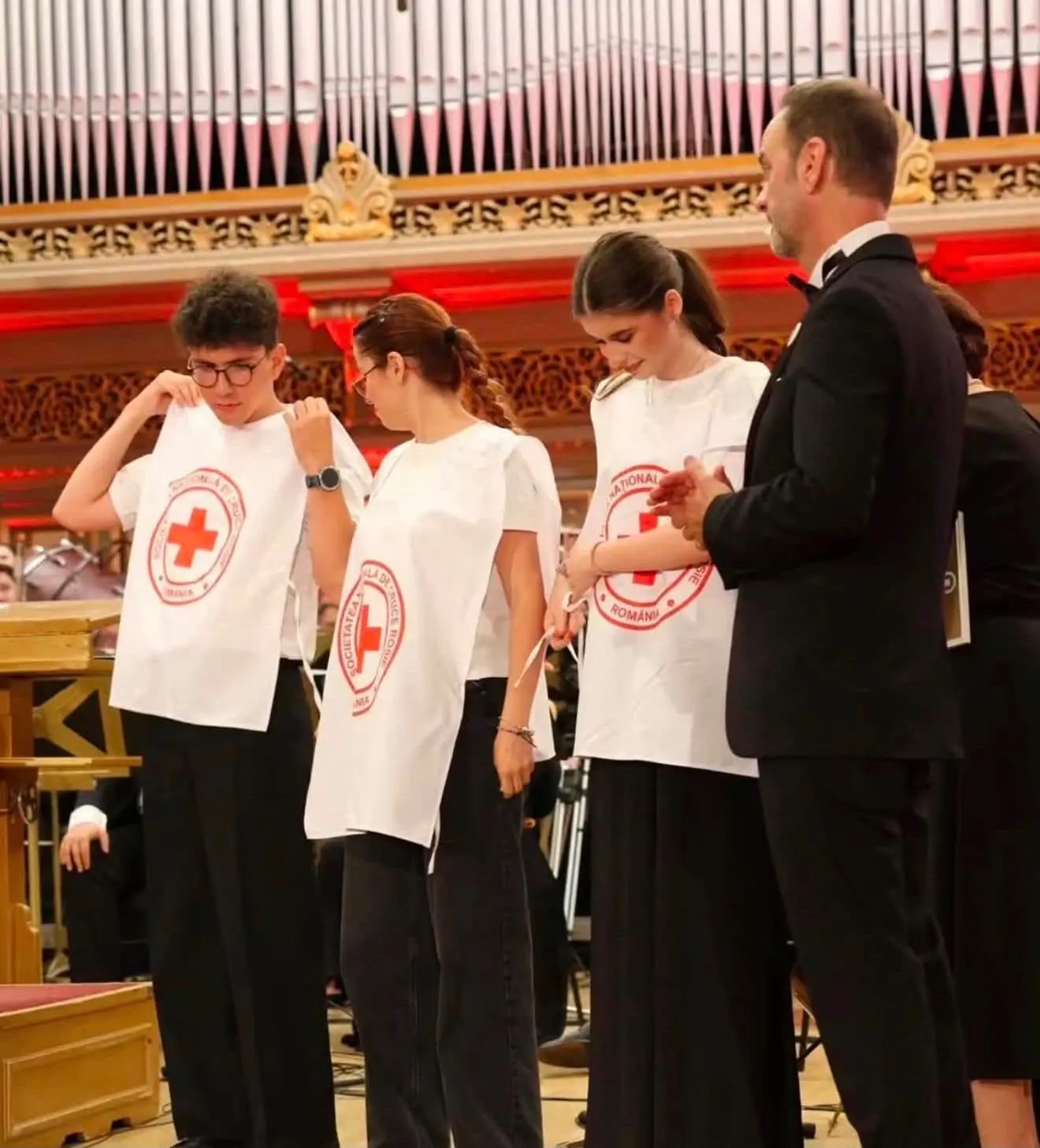 Sophia and fellow volunteers on stage at the Romanian Athenaeum